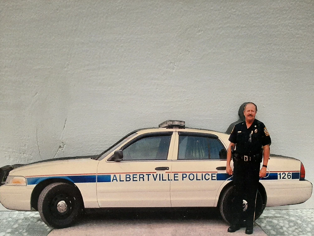 a picture of Ken with his police car