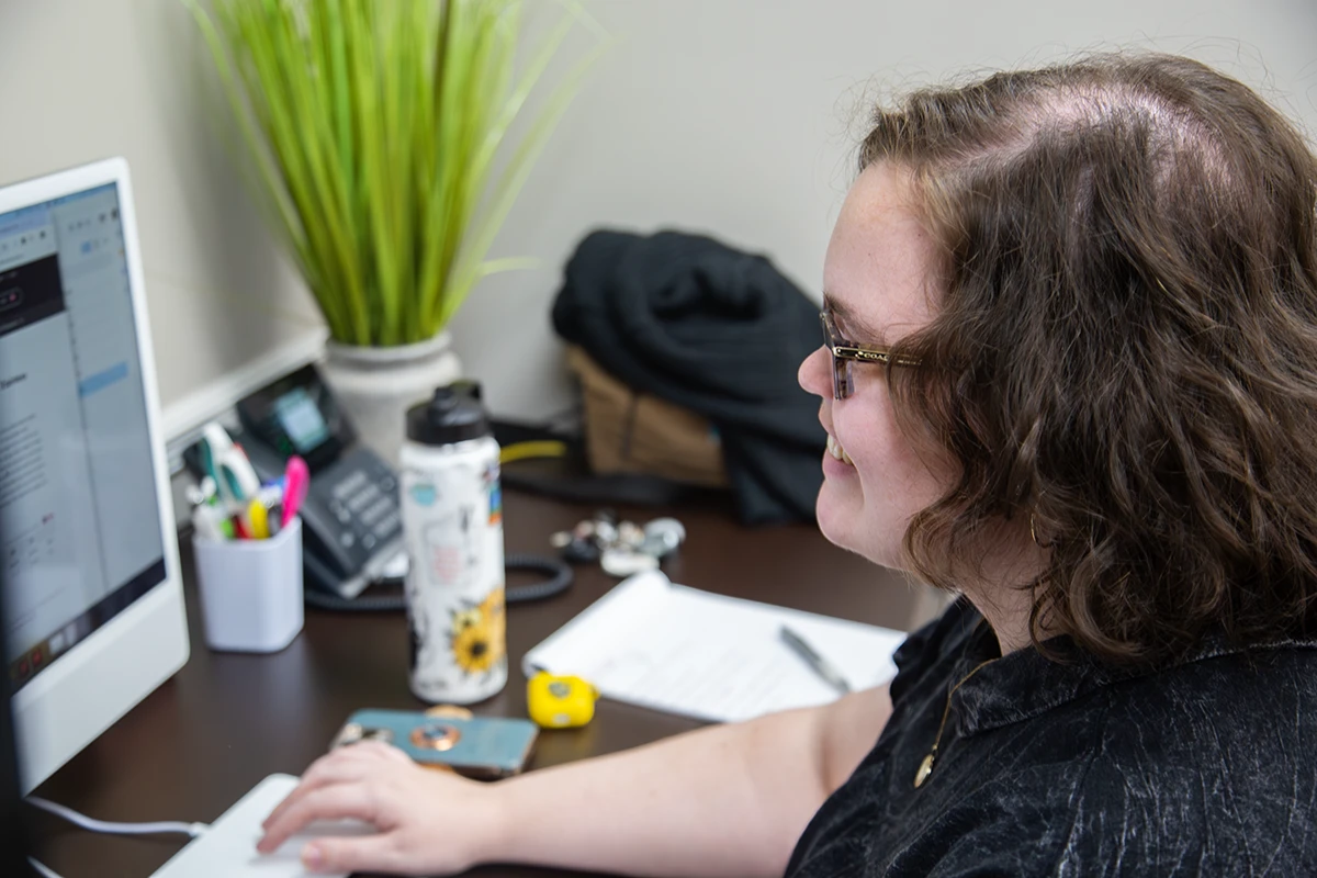BAP employee working at computer