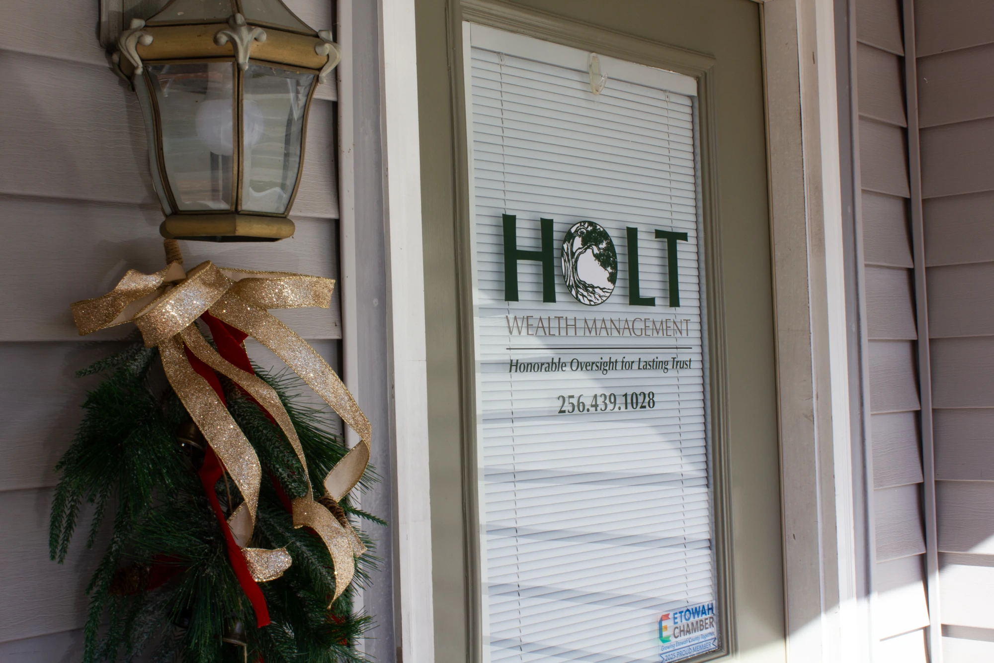 Holt's brand design details in door signage & exterior colors